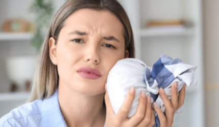 How Can I Manage Pain and Swelling After Extraction?